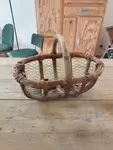 Children's fishing basket on foot