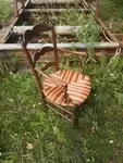 Old red straw armchair