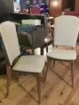 Pair of vintage chairs in white skai