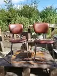 Pair of vintage chrome and skai chairs 