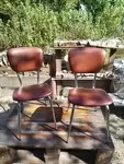 Pair of vintage chrome and skai chairs 