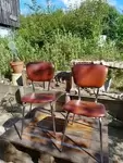 Pair of vintage chrome and skai chairs 