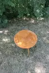 Round coffee table with compass legs