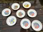 Set of eight vintage plates