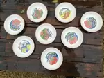 Set of eight vintage plates