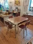 Table and four Formica chairs 