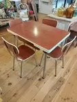 Table and four Formica chairs 