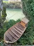 Wooden fishing boat model.