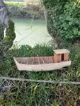 Wooden fishing boat model.