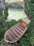 Wooden fishing boat model.