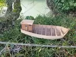 Wooden fishing boat model.