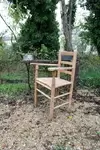 Wooden straw armchair