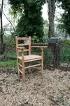 Wooden straw armchair